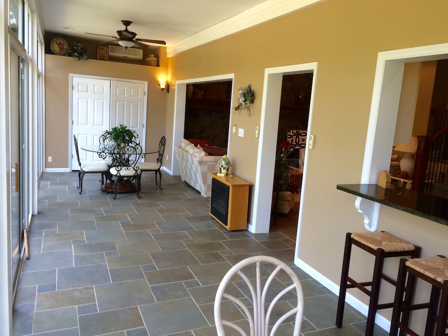 Two tables on front porch