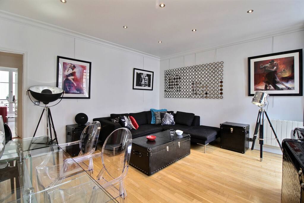 Living room with large sofa and TV