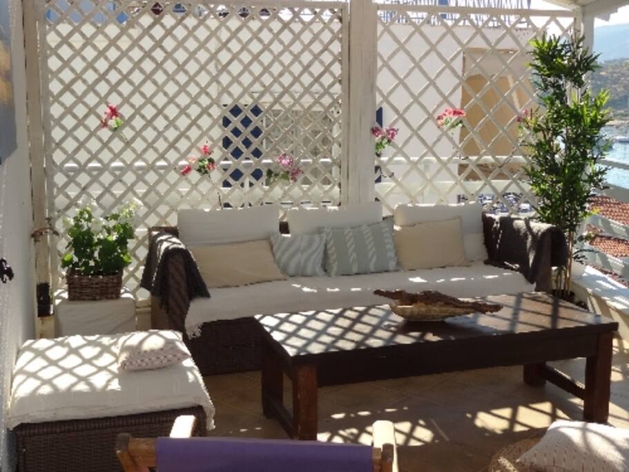 Terrace with panoramic sea views. Soft seating.