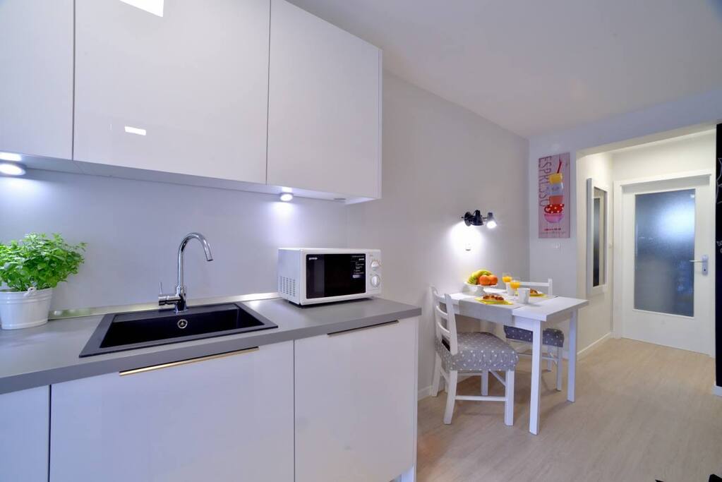 Our new modern kitchen with microwave, water boiler,dishwasher, toster and stove.