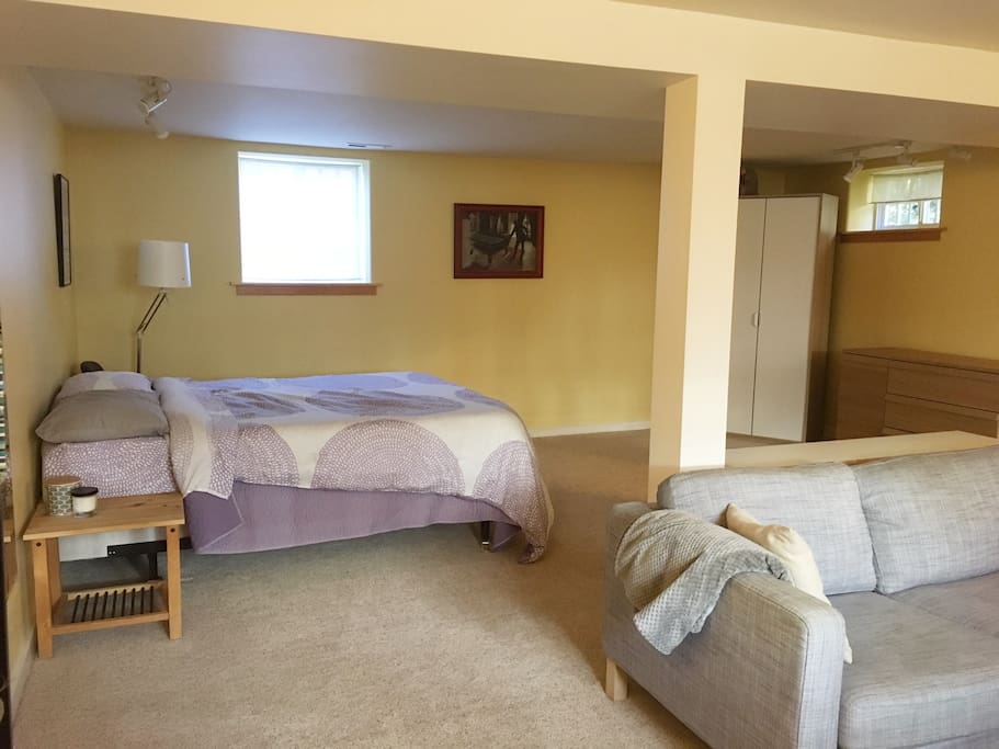 Sleeping area includes wardrobe and dresser