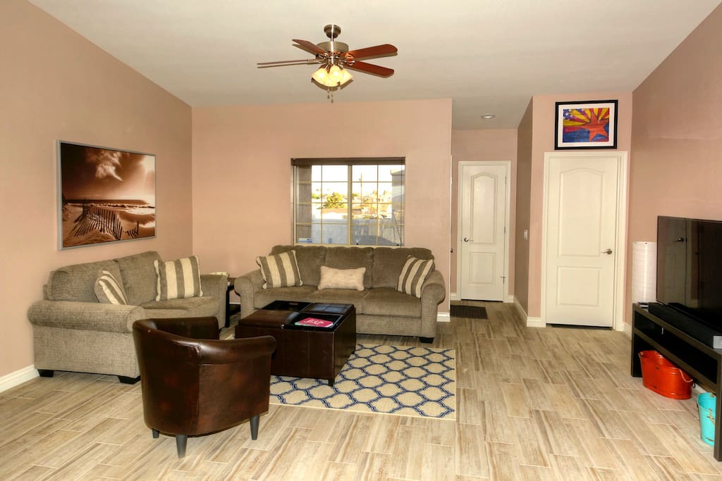 Living room - couch has a hide-a-bed, Apple TV, Smart TV, cable TV
