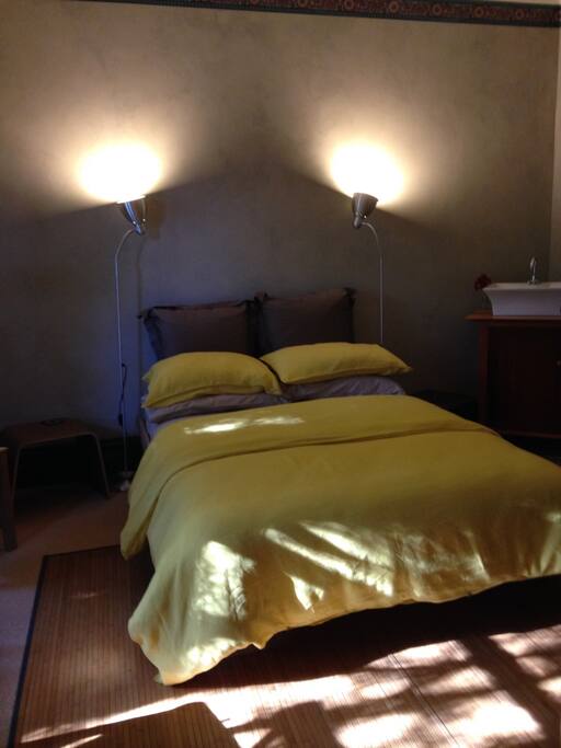 A serene room with quality linen for your comfort, great sleep..