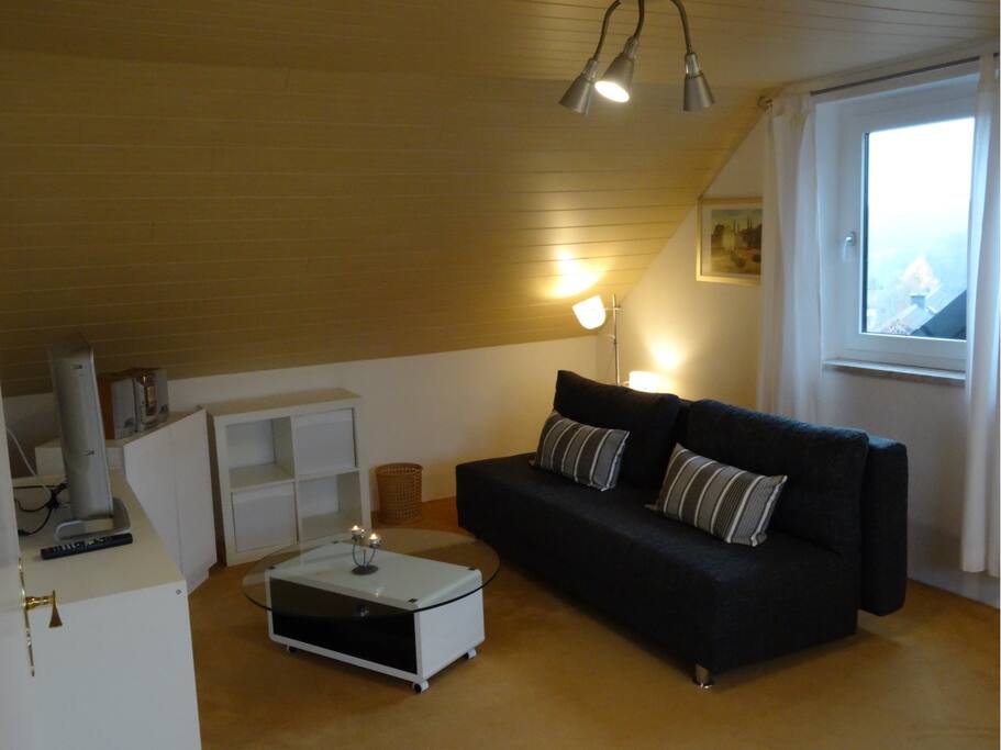 Wohnzimmer mit Klappcouch