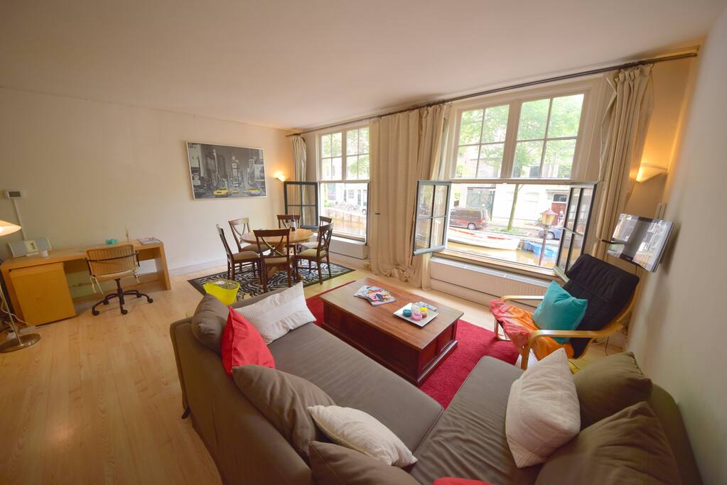 Spacious living room with large windows