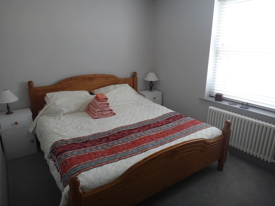 The main guest bedroom has a very comfortable superking bed - 6ft wide - with feather quilt