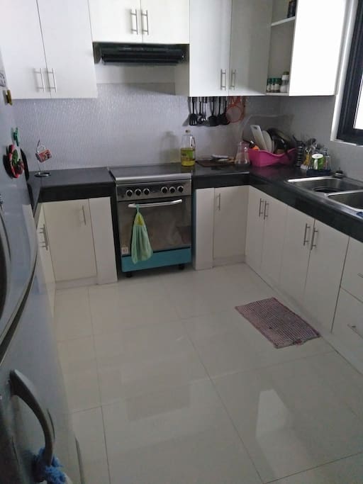 Full access to kitchen with stove and oven