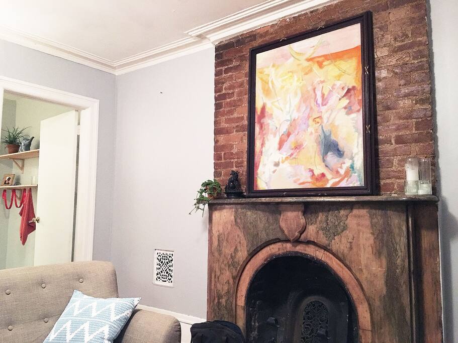 We have two beautiful (but non-functional) fireplaces.