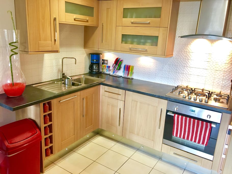 Kitchen with washer/dryer, fridge/freezer, gas stove and fan forced oven, coffee maker...
