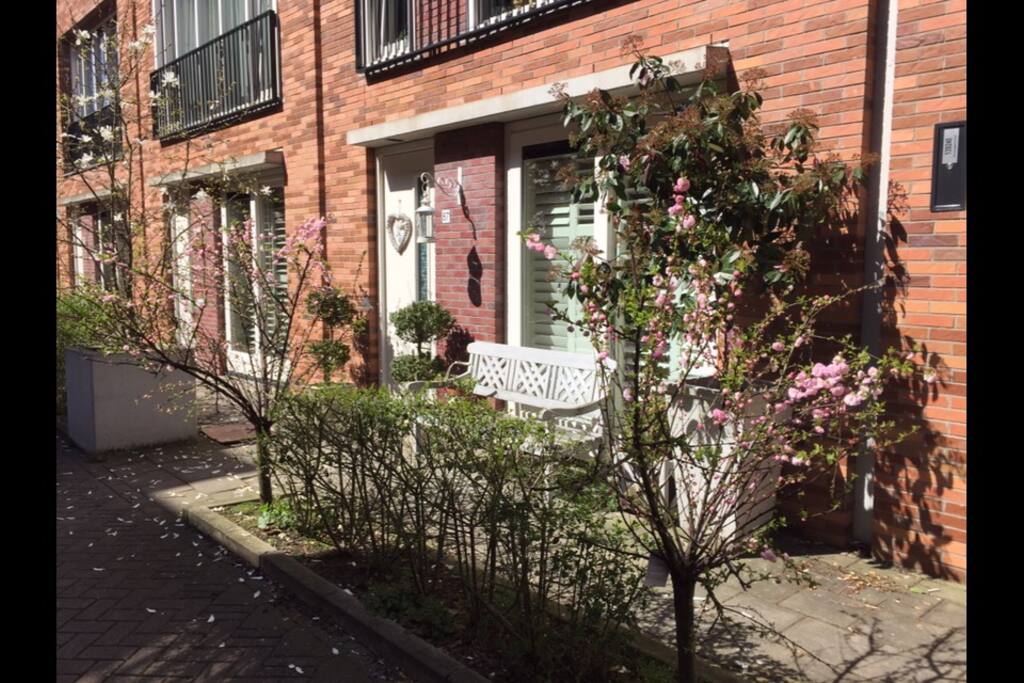 Sit on the bench on our front door and enjoy the sun.