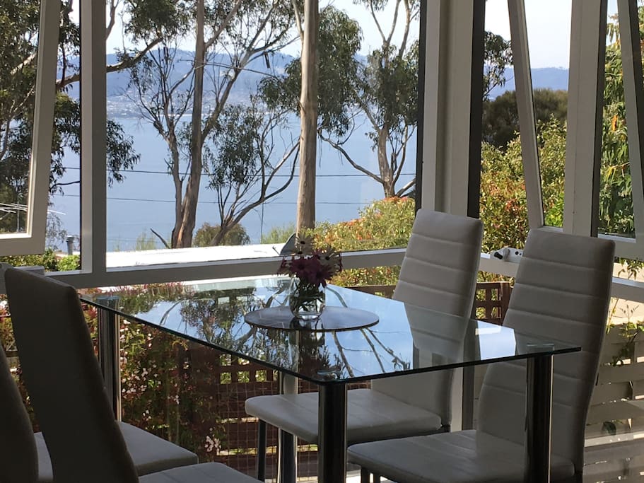 sunny north facing kitchen and dining with full length windows