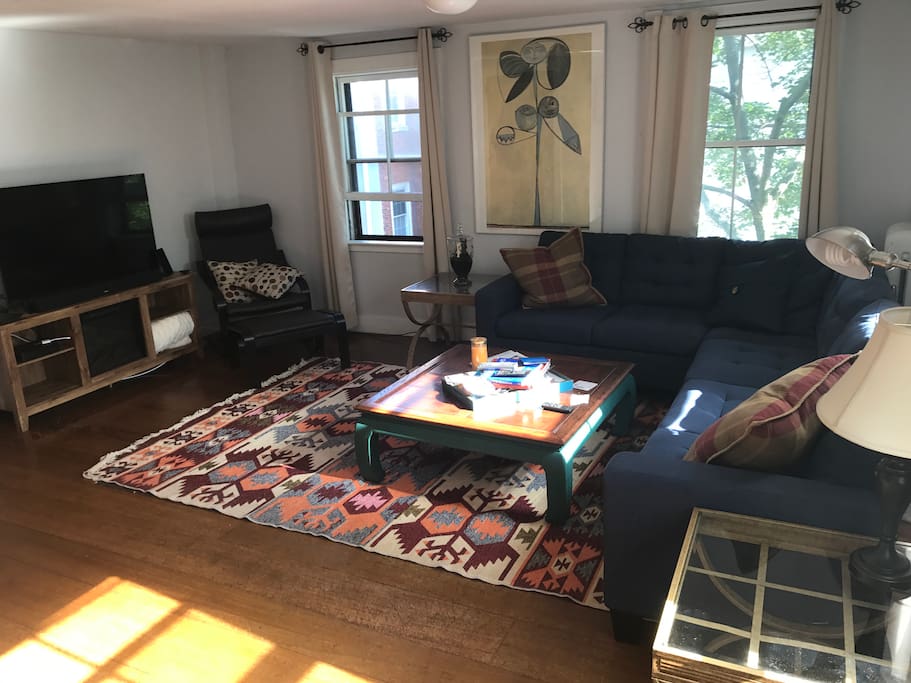 Living room has TV with cable and HBO.