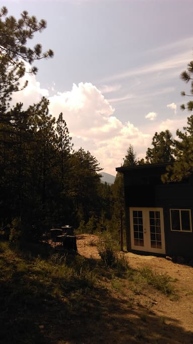 Private cabin tucked into private woods bordering national forest