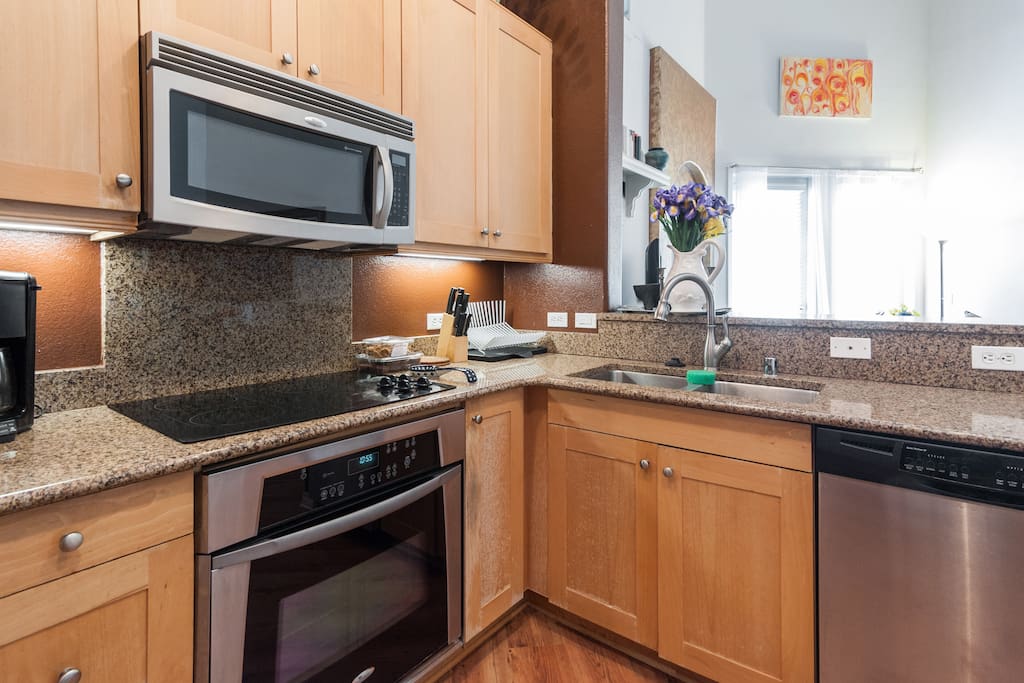 Fully stocked kitchen - oven, microwave, refrigerator, dishwaters, glassware, silverware, pots and pans, cooking utensils, tupperware, tea pot and coffee pot, among many other fun things to make your stay feel like home.