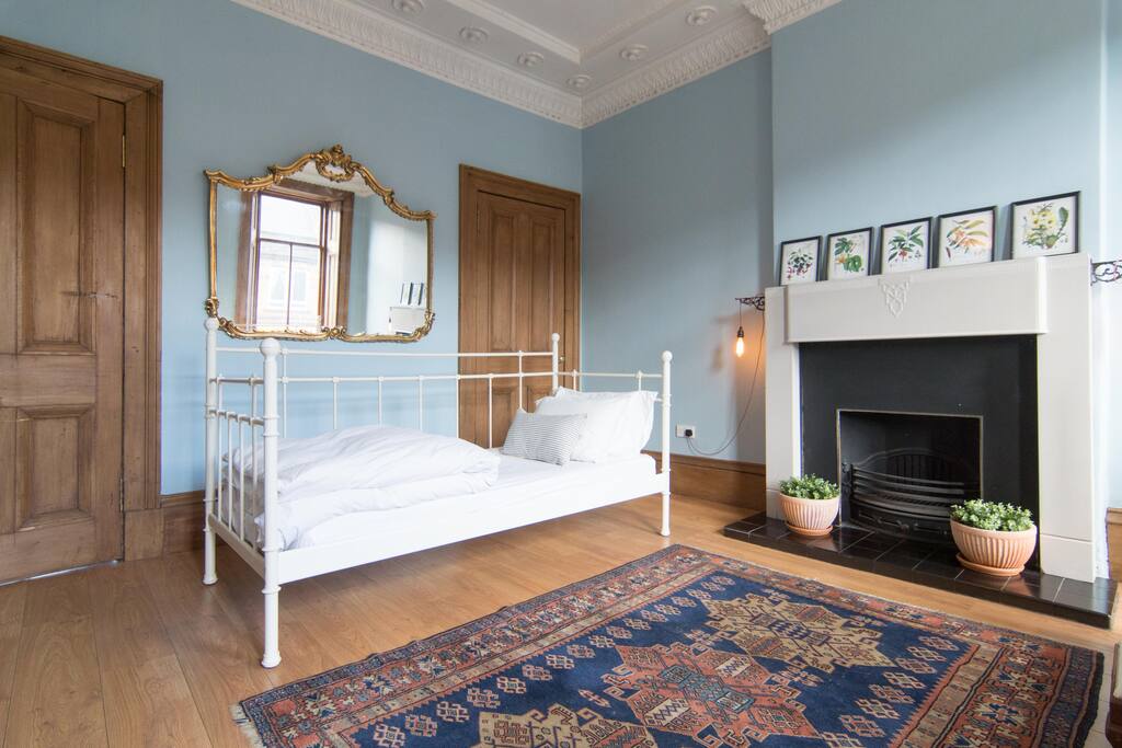 one of the day beds made up to sleep in for a guest...