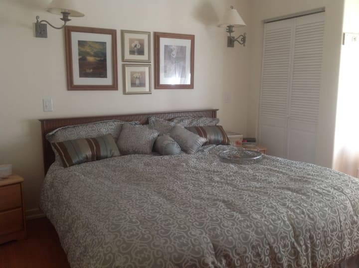 King bed in master with dimming lights, 2 closets, window seat, and privacy