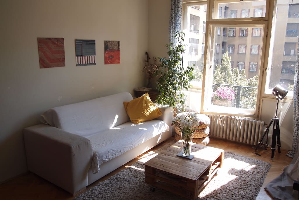 Living room, lots of light and sunshine, window to yourtyard with no cars. Piano in the room, big enough for two people or even three. The white sofa is now replaced with the blue one, see next picture please.