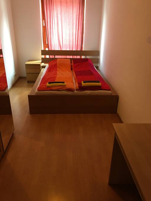Bedroom 1, with huge wardrobe, mirror and desk
