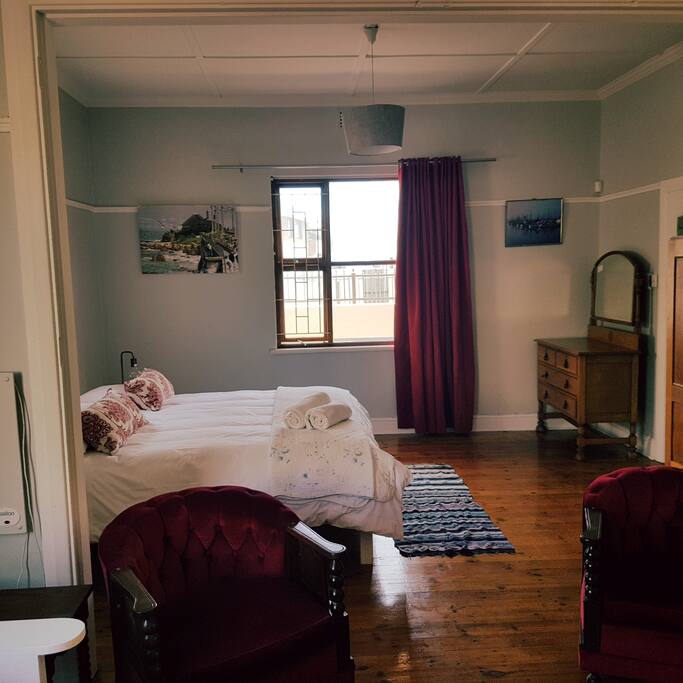 King-size bed with crisp white linen