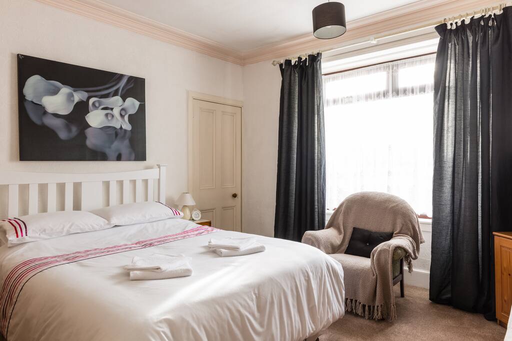 The large window fills this room with wonderful light!