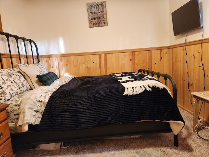 Queen bed, 32 in roku smart tv, armoire,  2 night stands, arm chair