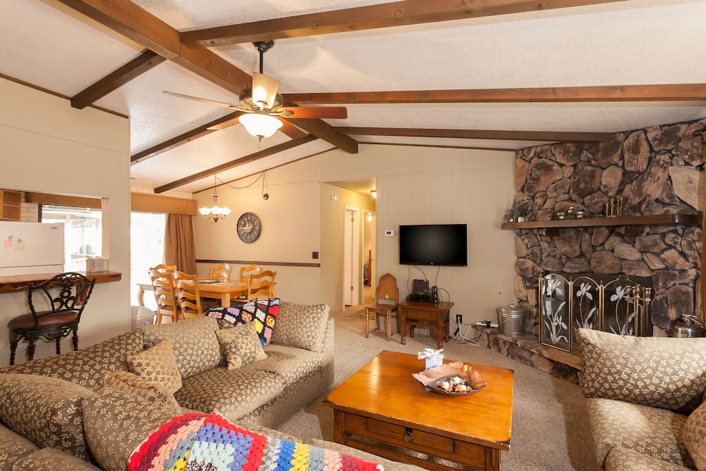 Great living area with Flatscreen TV with Cable. Rock woodburning fireplace.