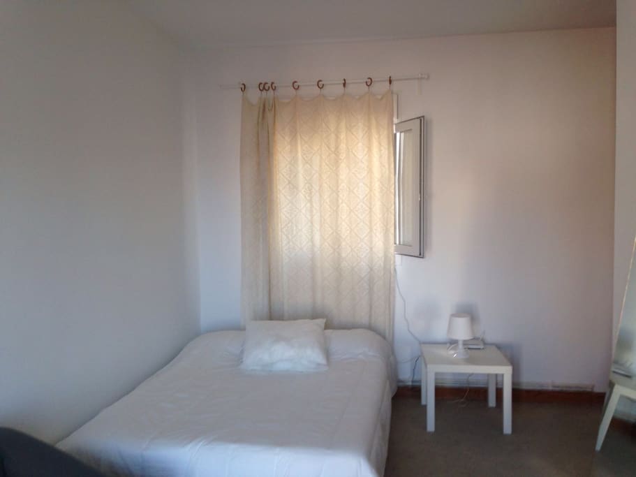 Very bright huge bedroom with balcony. King double bed, massive wardrobe, sofa and desk