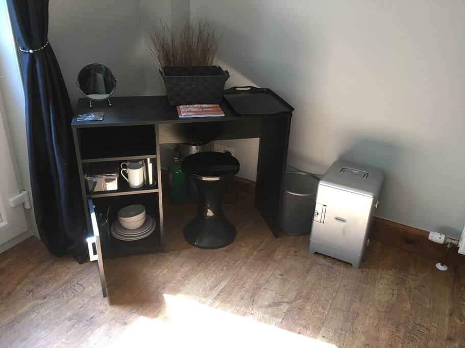 Desk area and small fridge