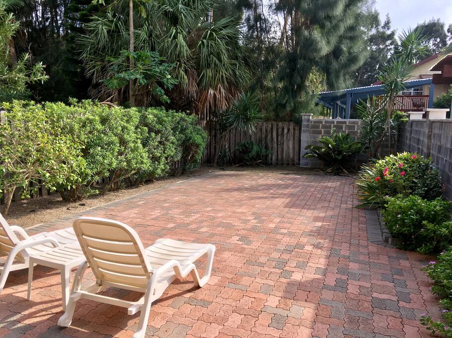 Sunbathing in your own back yard before you take your walk to the beach