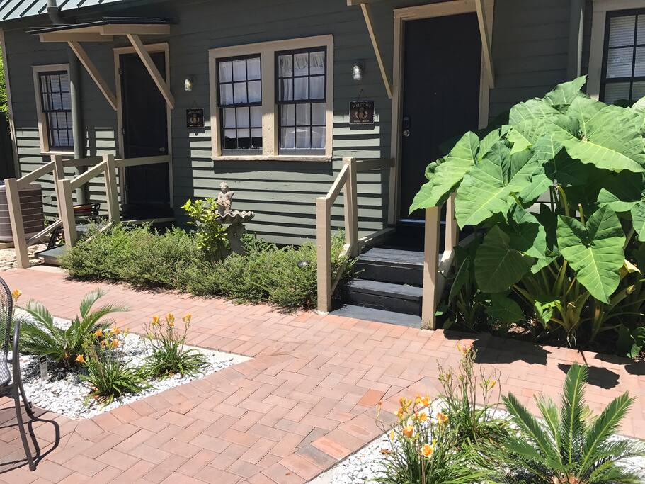 Historic Cottages Are Side by Side Vacation Rental Units. Patio Is Shared