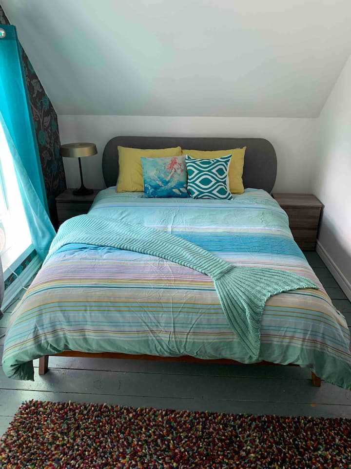 This bedroom has 2 windows and is great for "morning people"!