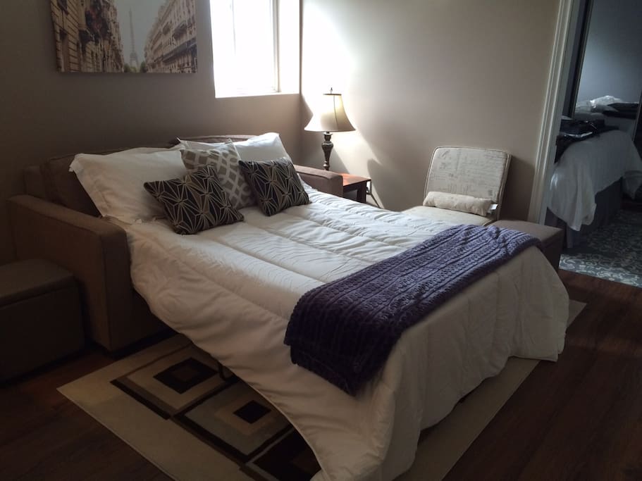 The pullout sleeper sofa provides versatility for those who need an extra bed for part of their stay.