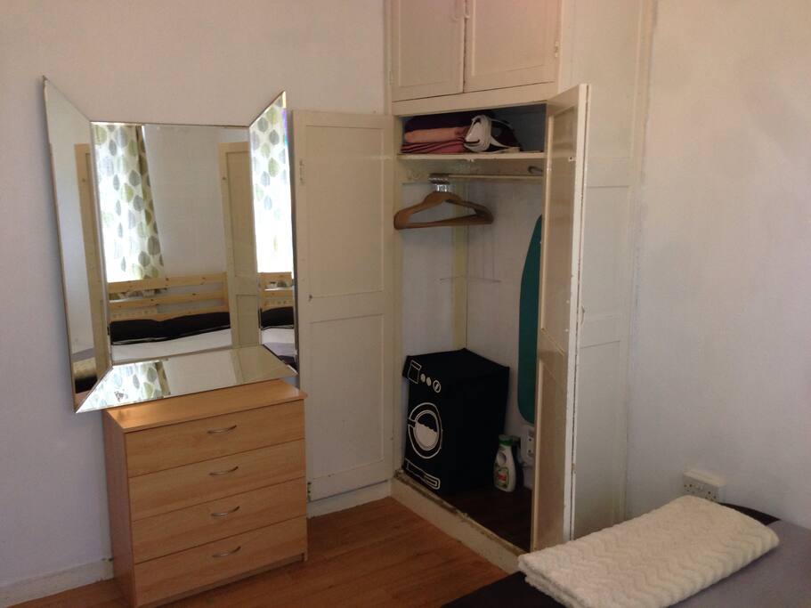 Loads of wardrope and chest of drawers space.