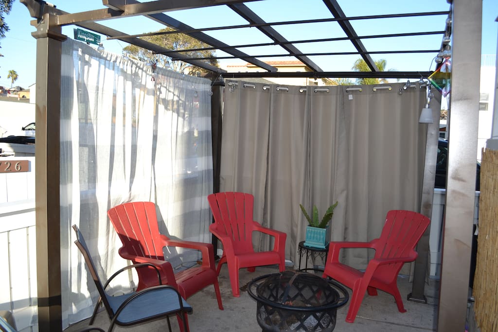 There is a shared court yard on the walk street. Enjoy the fire pit and BBQ with neighbors while waving to people walking to the beach!