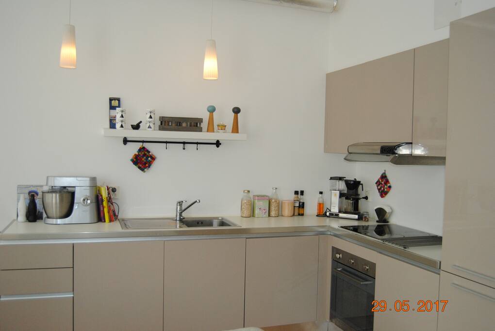 The kitchen is combined with the living room. It has all you need to cook some nice meals.