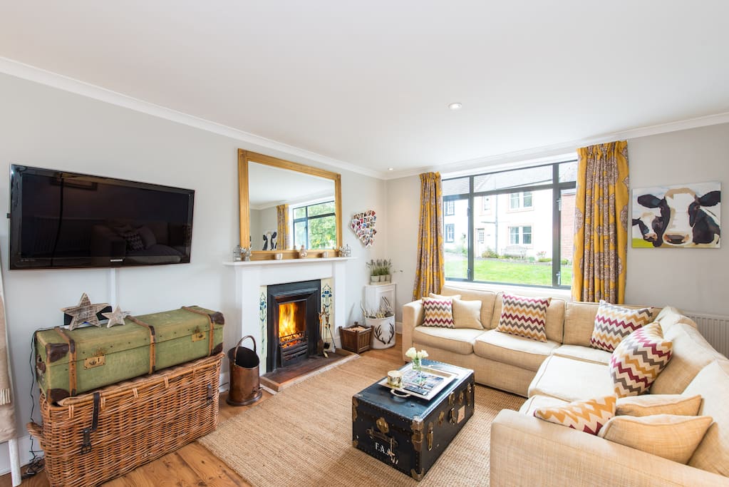 Sitting/dining room with cosy open fire