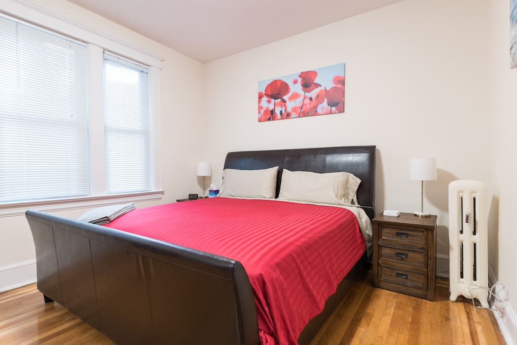 Master Suite-Angle 1: Features a King Sized bed and an adjoining room with a bunk bed that can accommodate an extra 2 guests!
