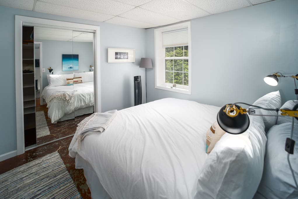 King size Sleep Number® bed with large closet space in the bedroom.
