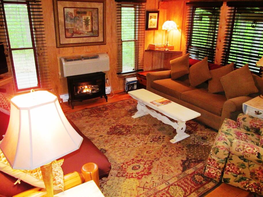 Spacious family room with comfortable sofa and queen futon.