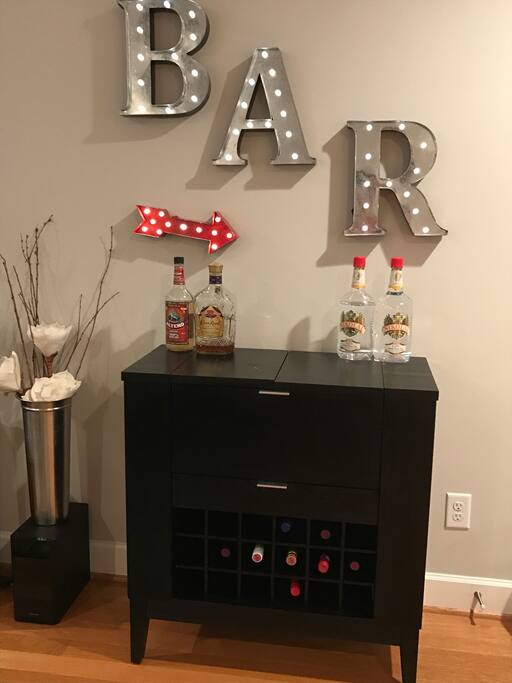 Stocked bar - with a few bottles at your disposal.