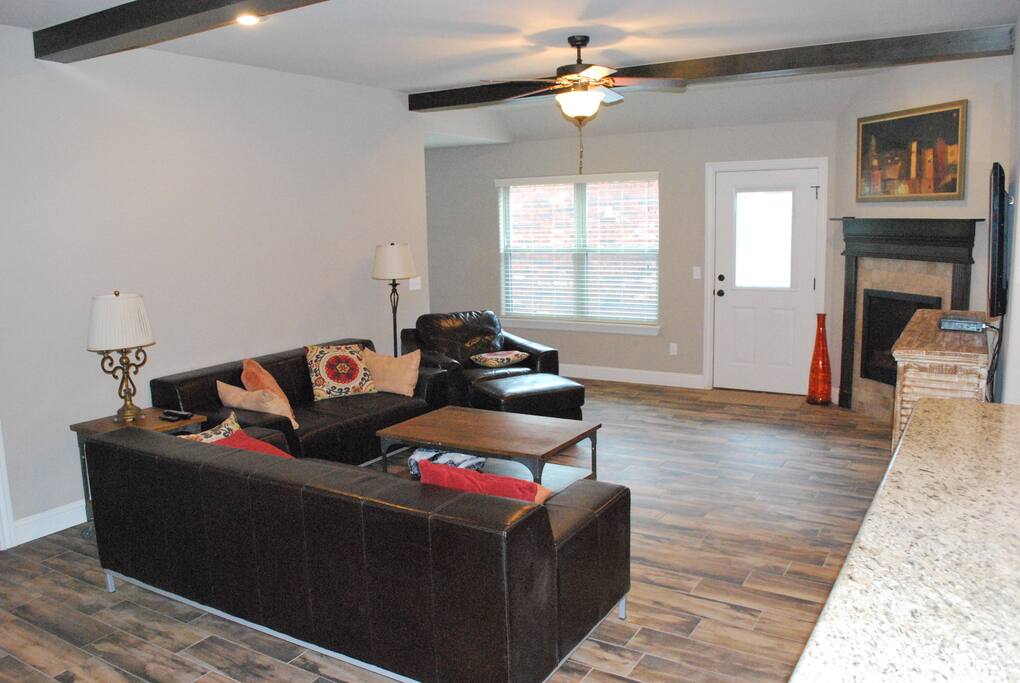 family room leather furniture and fireplace