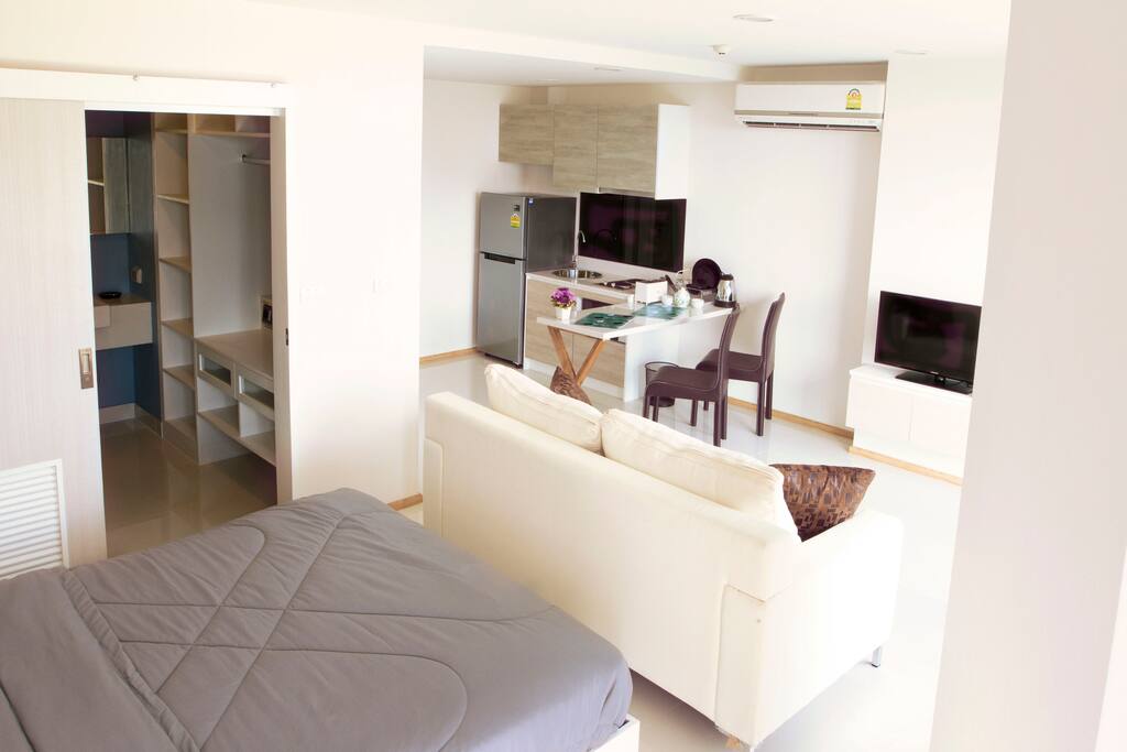 Bed and bathroom