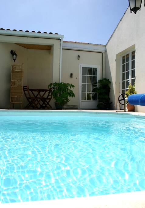 Front door of studio, and pool