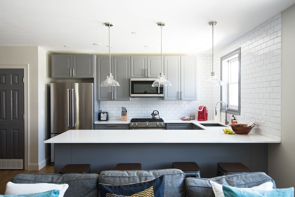 Large modern kitchen with seating for 4