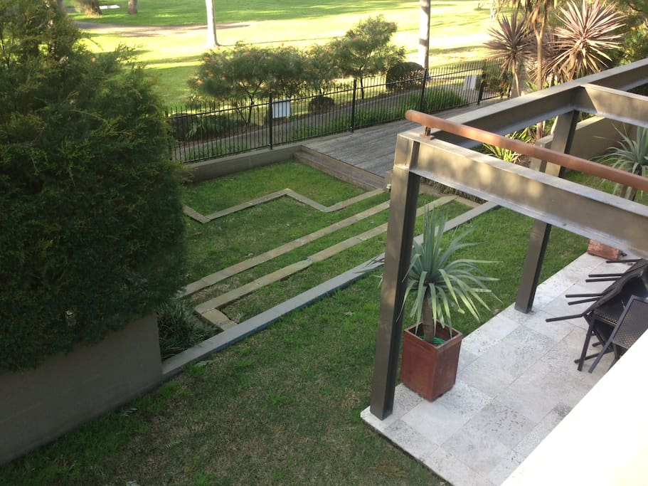 Retractable awning above outdoor entertaining area