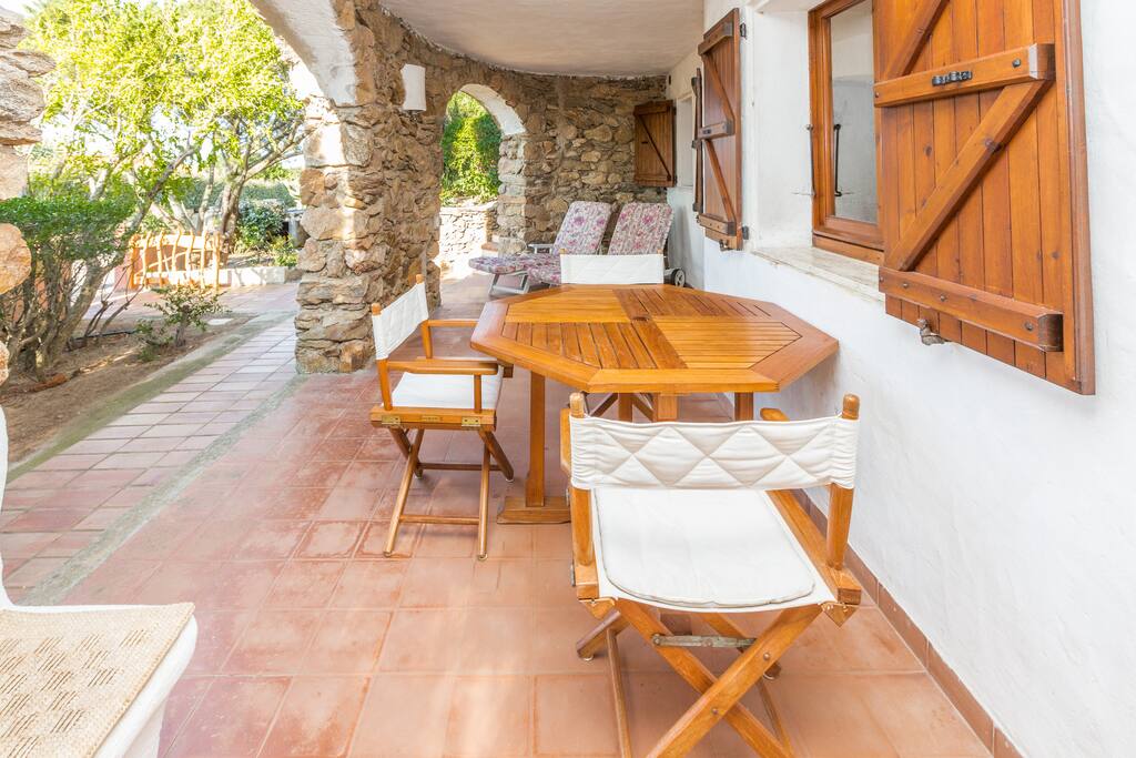 Porch with local granite arches