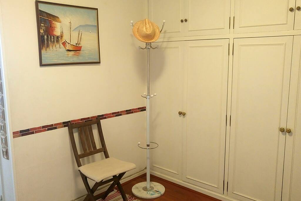 Main entrance with cupboards and large area to leave your bags