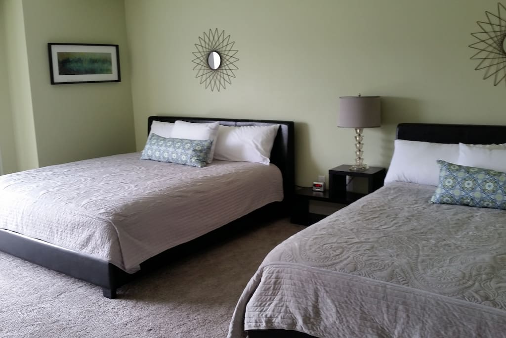 Bedroom features one king bed and one queen bed
