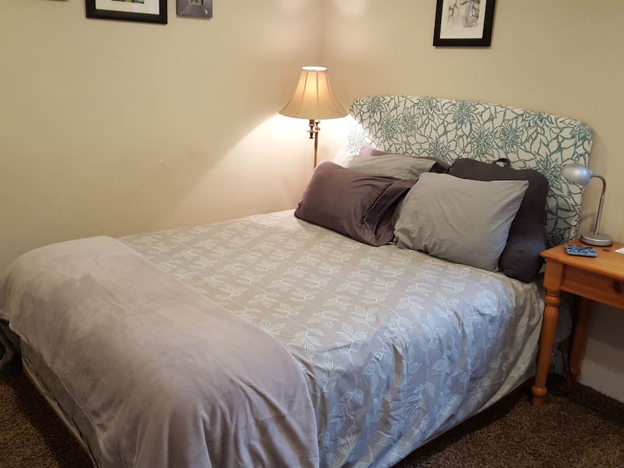 Your room, comfy queen sized bed.