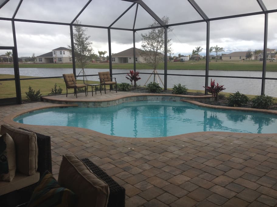 Swimming pool and lanai on the lake.